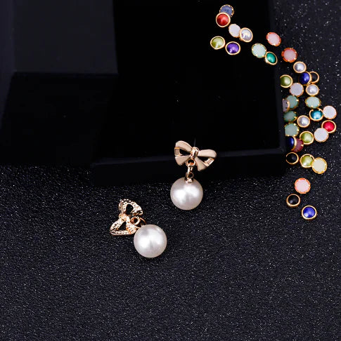 Pearl Drop Earrings with Bowknot Design